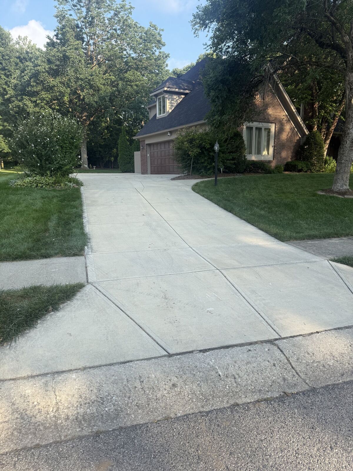 Concrete driveway before pressure washing