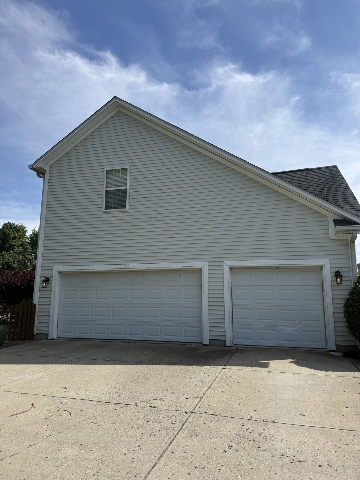 Home siding before house washing, with visible streaking